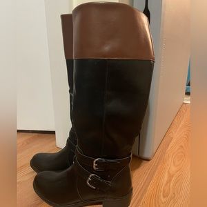 Knee high black boots. Size 6. Never worn.